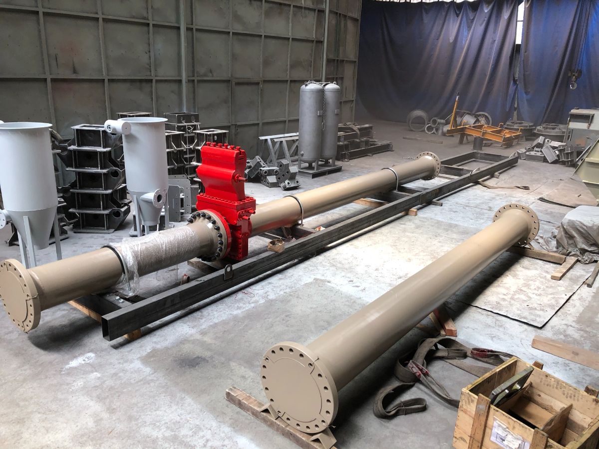 Skid frame and meter spool under assembly
