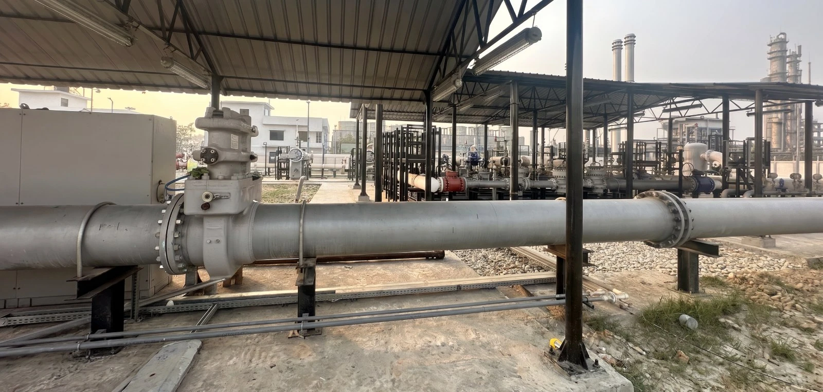 Gas metering station with instrument cabinets under a canopy