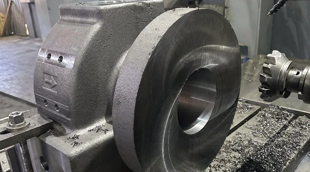 Cast fitting body on the boring mill, bore and seat faces machined